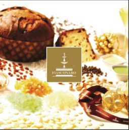 Panettone artigianale Fiasconaro con canditi, cioccolato e crema. Dolce natalizio siciliano di alta qualità.