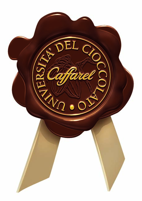 Coccarda Università del Cioccolato Caffarel. Sigillo in cioccolato con logo Caffarel. Dolci, cioccolato artigianale.