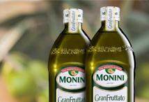 Bottiglie di olio extra vergine di oliva Monini GranFruttato. Olio EVO dal gusto intenso e fruttato.