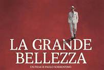 Locandina del film La Grande Bellezza. Uomo in abito bianco. Film italiano.
