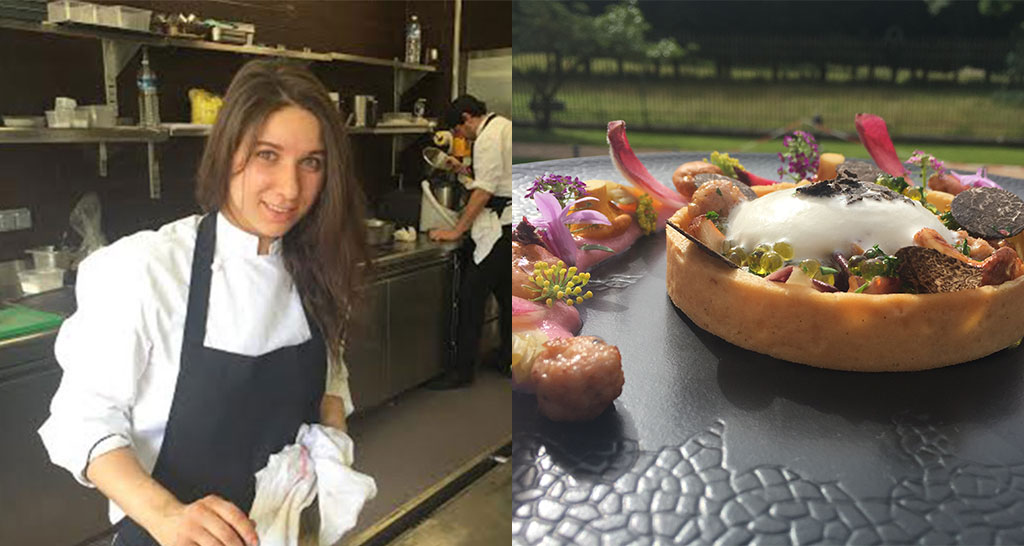 Chef donna in cucina con torta gourmet ai funghi e tartufo. Alta cucina italiana.