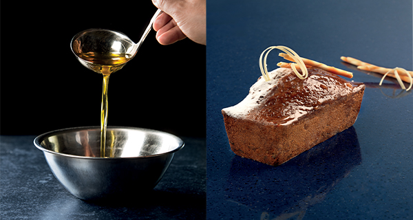 Burro liquido Corman versato e torta decorata. Ingredienti per pasticceria e dolci.