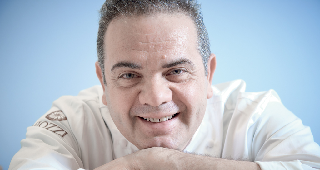 Ritratto di chef sorridente. Cucina italiana, alta ristorazione. Chef Miozzi.