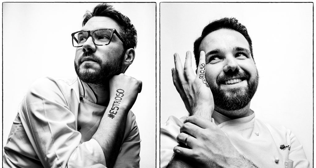 Ritratto in bianco e nero di Simone Gardellin, chef con hashtag #curioso e #estroso sul braccio.