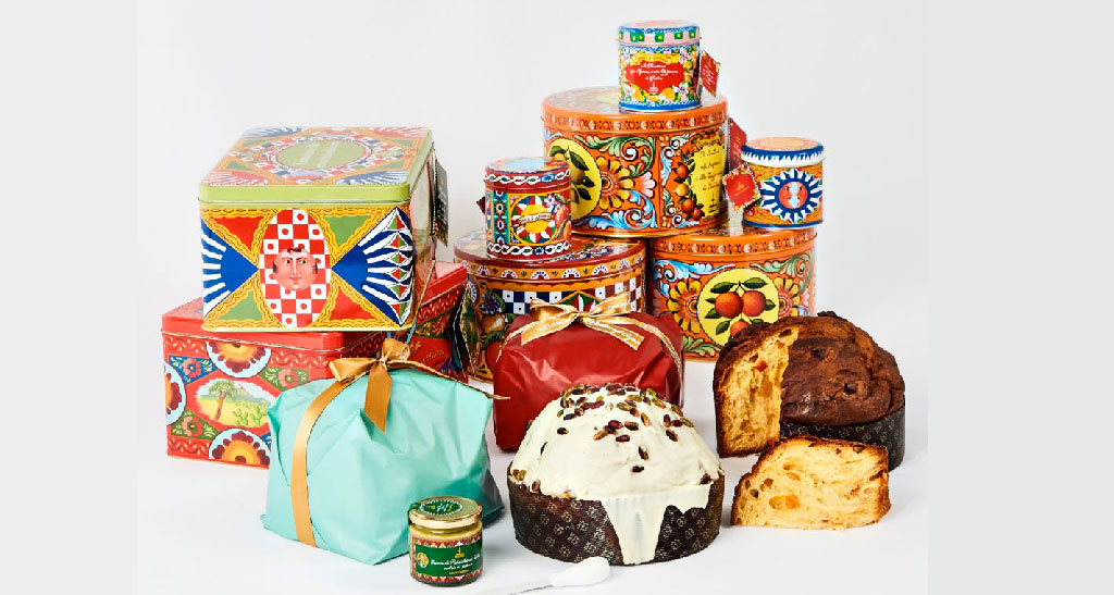 Panettoni artigianali Fiasconaro e Dolce&Gabbana in confezioni decorate. Dolci tipici natalizi italiani.