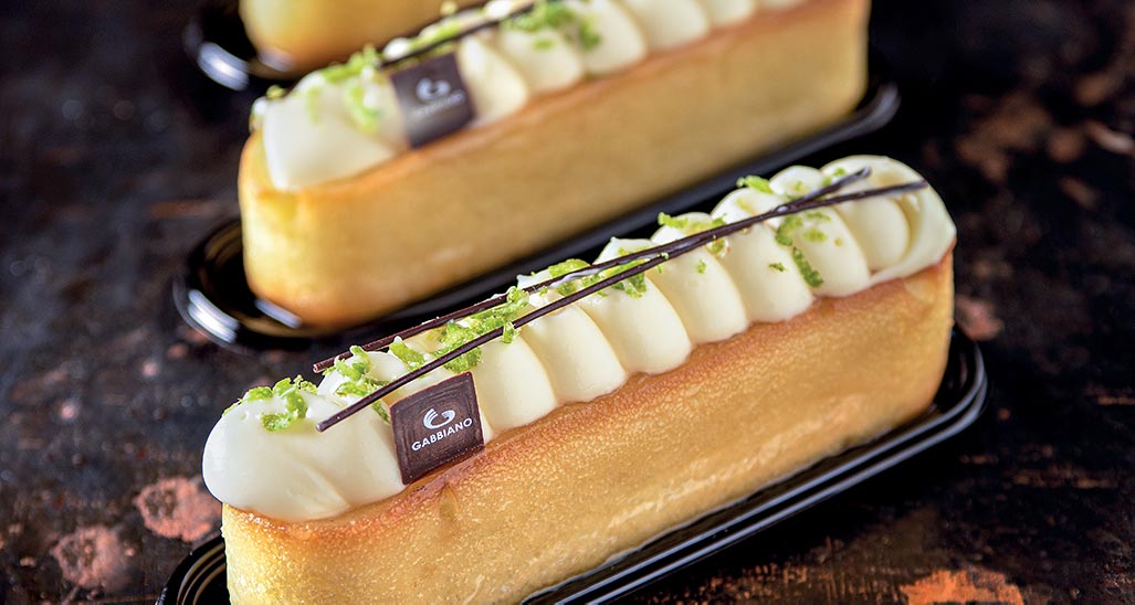Dolci Gabbiano: torta rettangolare con crema, lime e cioccolato. Pasticceria artigianale.