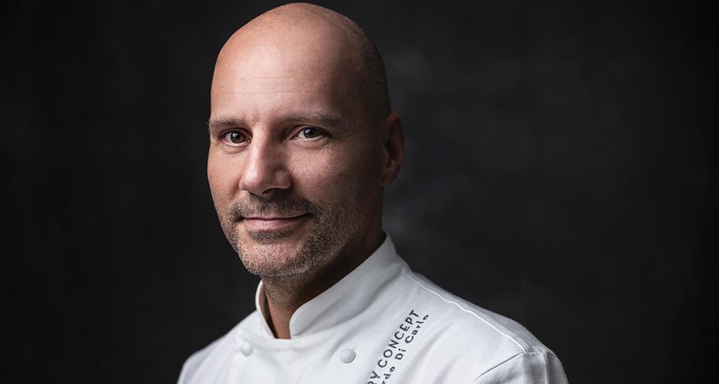 Ritratto dello chef Di Carlo. Cucina d'autore, alta gastronomia. Chef stellato, cucina italiana.