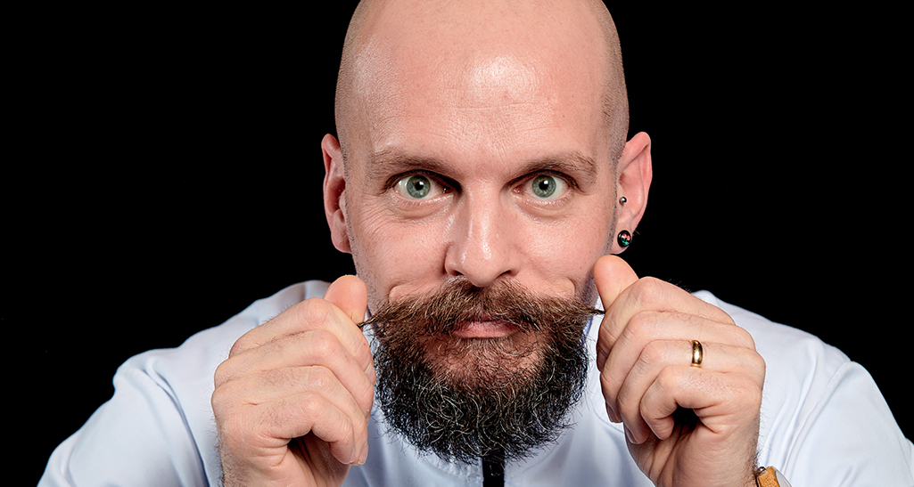 Uomo calvo con barba folta e baffi arricciati. Ritratto di Francesco Bertuzzi.