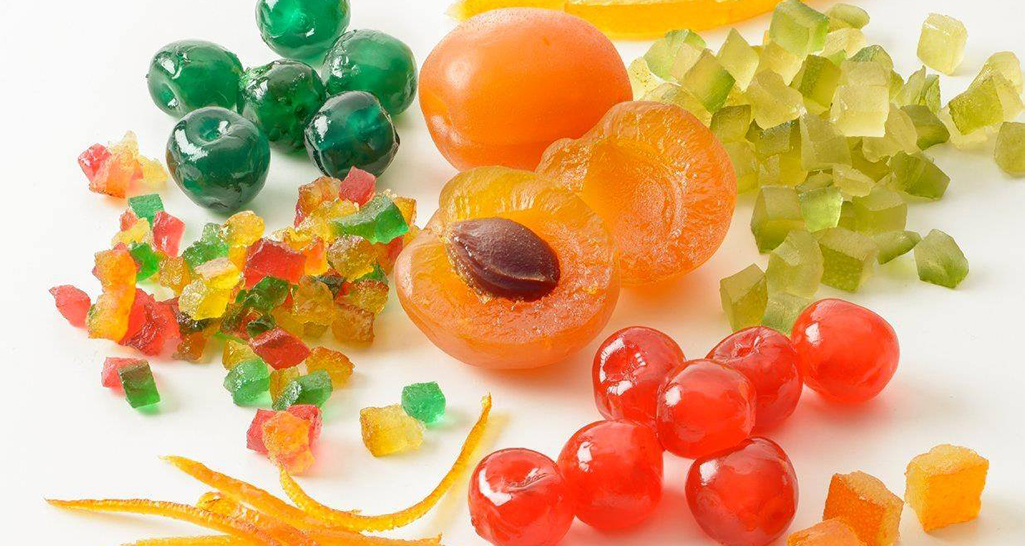 Frutta candita assortita: ciliegie, albicocche, cedro e scorze d'arancia. Ideale per dolci e decorazioni.