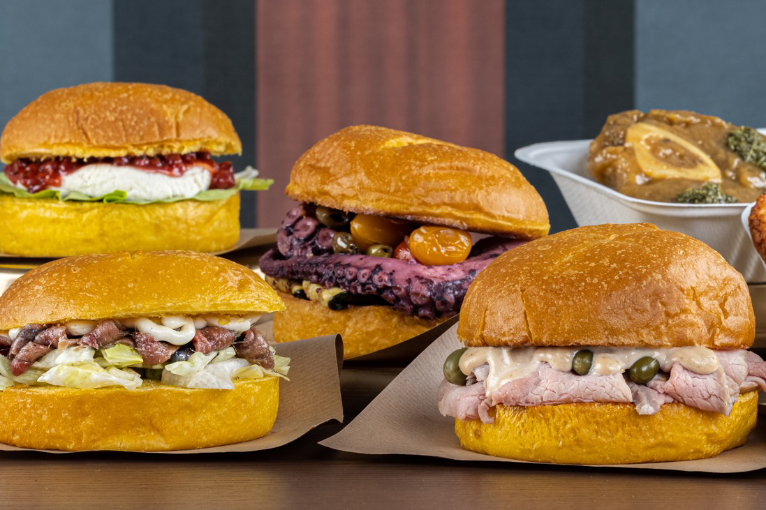 Nuovi progetti milanesi: bakery con panini gourmet. Hamburger con polpo, vitello tonnato, acciughe e formaggio.