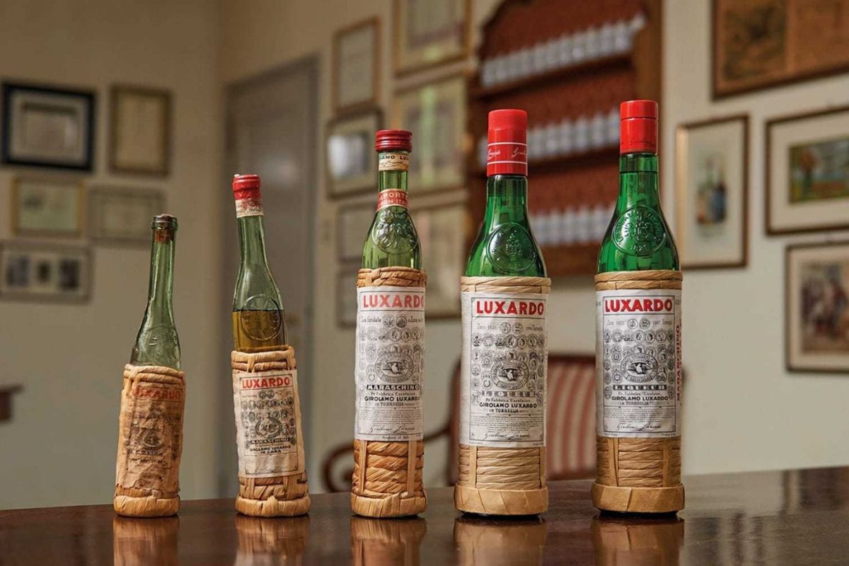 Bottiglie storiche di Maraschino Luxardo, eccellenza italiana dal 1821. Liquore di Padova.